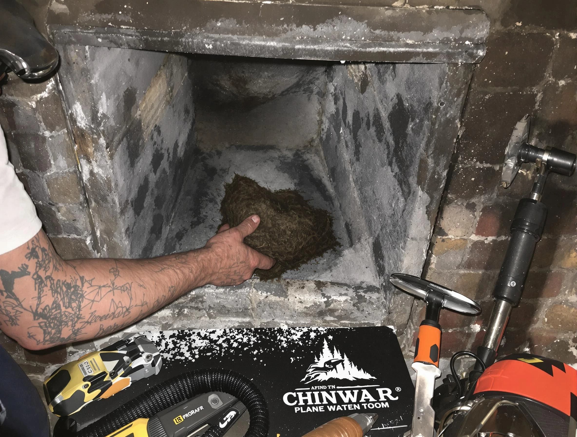 New Sewickley Chimney Sweep safely removing debris and screening chimney in New Sewickley, PA