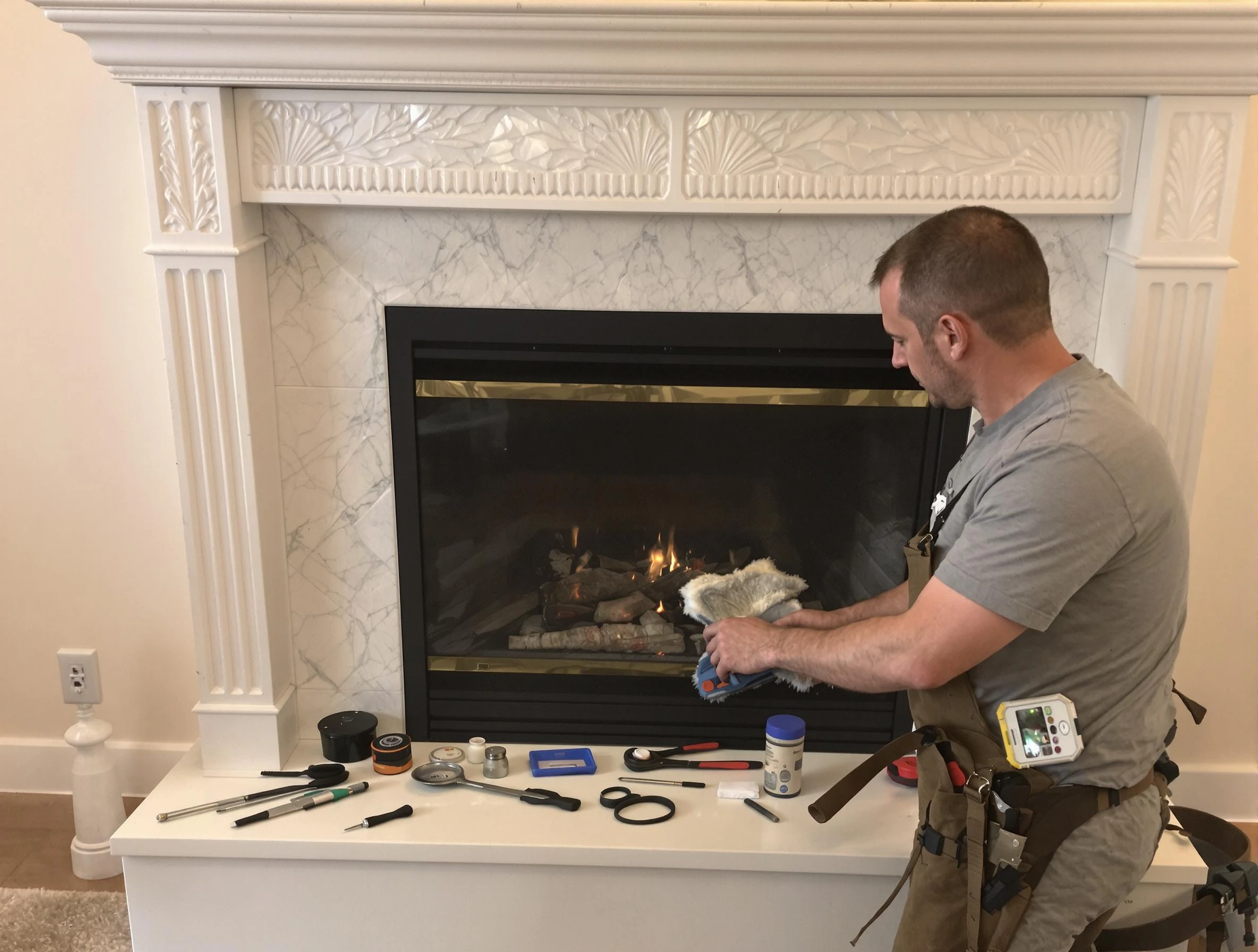 New Sewickley Chimney Sweep performing fireplace maintenance in New Sewickley, PA